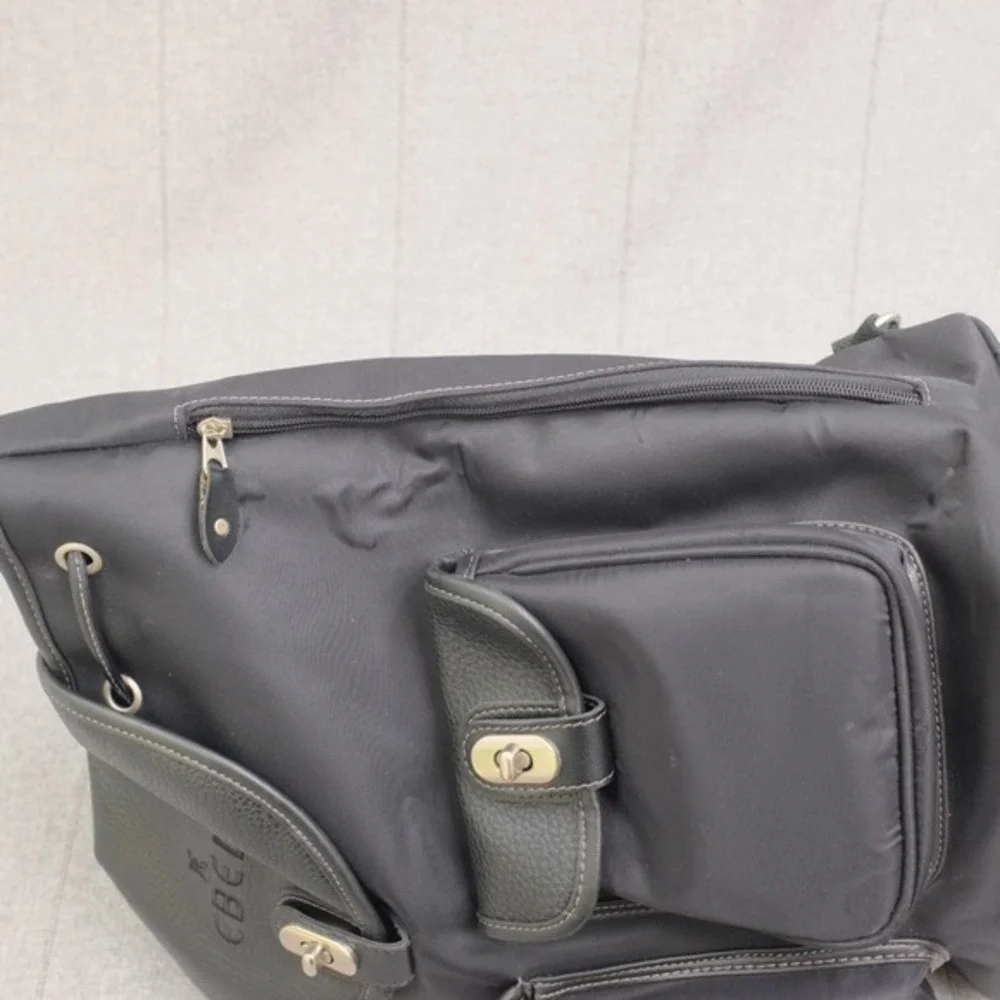 Ebel Black Nylon Faux Leather Turn Lock Cinch‎ Top Travel Backpack